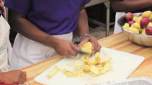 A screencap from the Second Harvest video on the Harvest Kitchen.